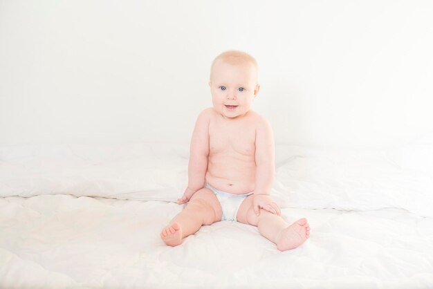 portrait of a cute baby in a diaper