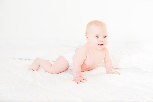 portrait of a cute baby in a diaper
