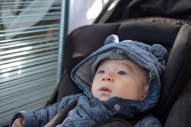 portrait of cute baby girl in car