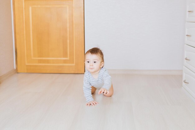 Photo portrait of cute baby girl at home