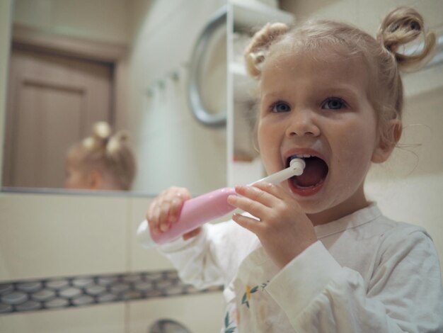 Photo portrait of cute baby girl at home