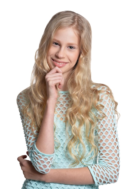 Portrait of cute blonde teen girl on white background