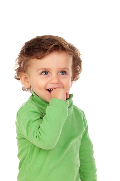 Portrait of cute boy against white background