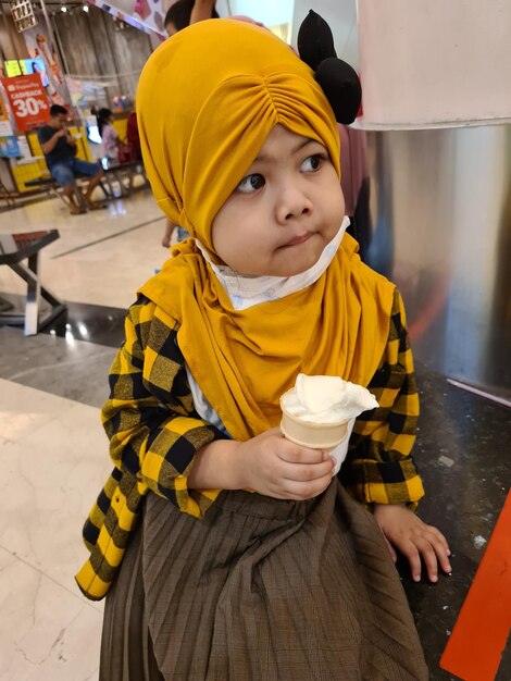 Portrait of cute boy holding ice cream