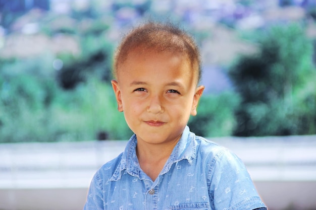 Portrait of cute boy outdoors