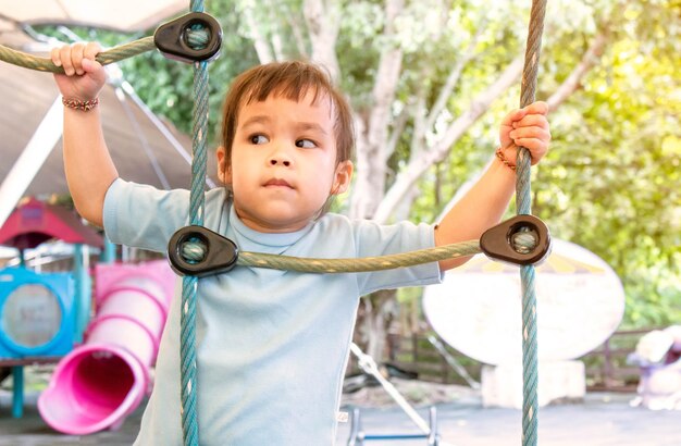 Portrait of cute boy playing