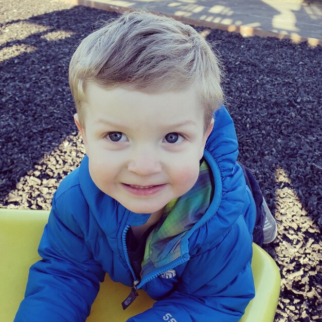 Photo portrait of cute boy smiling