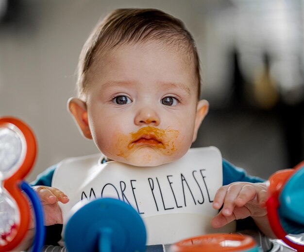 Portrait of cute boy with toy