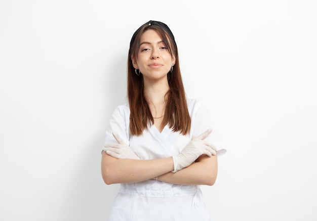 Portrait of cute doctor woman on white background