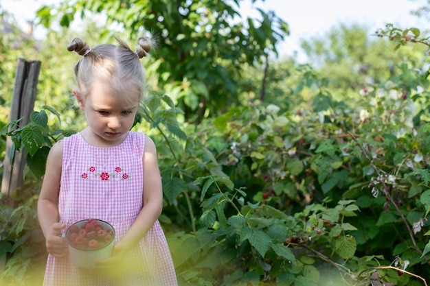 Portrait of cute girl holding apple