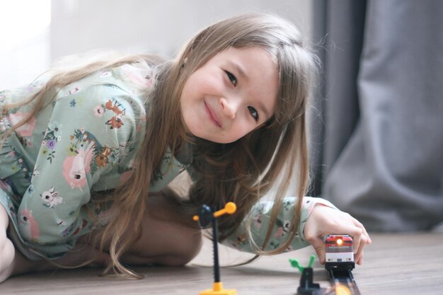 Photo portrait of cute girl at home