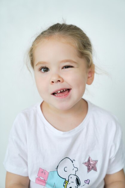 Photo portrait of cute girl at home