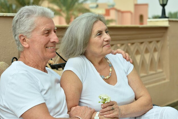 Portrait of cute happy senior couple outdoors