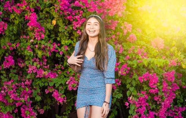 Portrait of a cute latin girl smiling in a garden cute young brown latin girl smiling in the garden