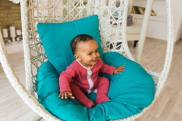 Portrait of a cute little African American boy smiling.