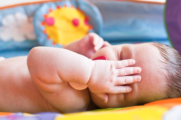 Portrait of cute little baby sleeping peacefully