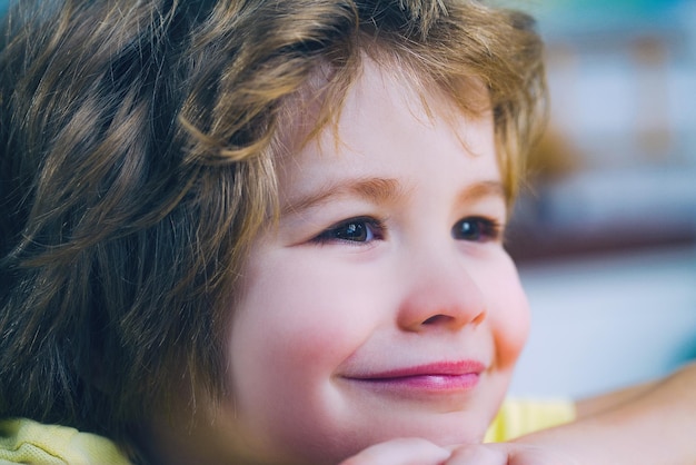 Photo portrait of a cute little boy smiling