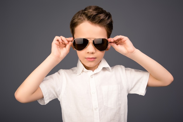 Portrait of cute little boy with glasses