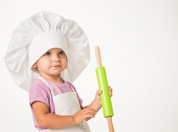 Foto ritratto di un bambino carino in un cappello da chef