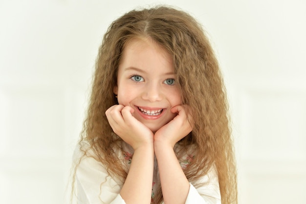 Portrait of a cute little girl posing