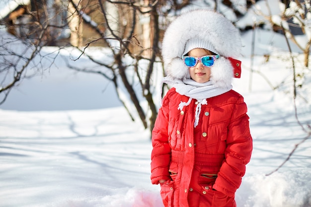 Portrait of cute little girl in winter