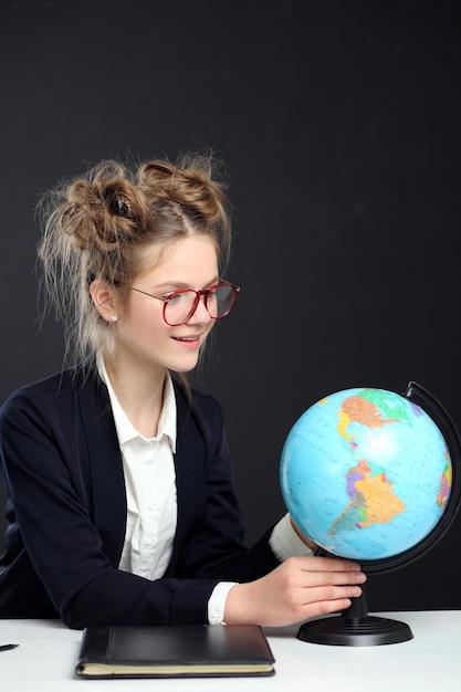 Portrait of cute little schoolgirl