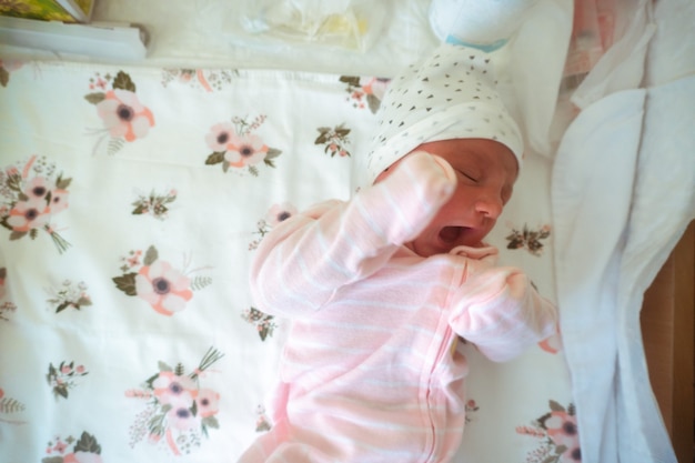 Portrait of a cute newborn baby girl