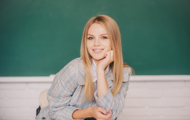 Portrait of cute smilimg female university student study lesson at school or university Education and learning concept