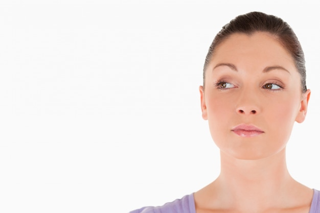 Photo portrait of a cute woman posing while standing