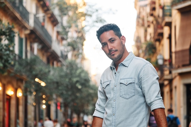 Portrait of a darkhaired Latin boy posing for a photo session