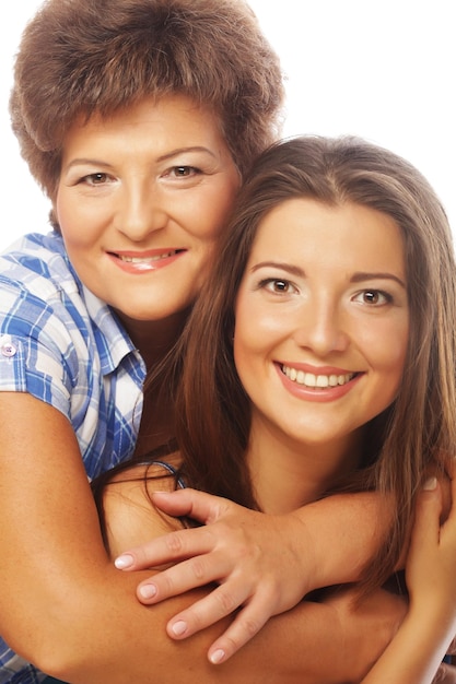 Portrait of daughter embracing her mother