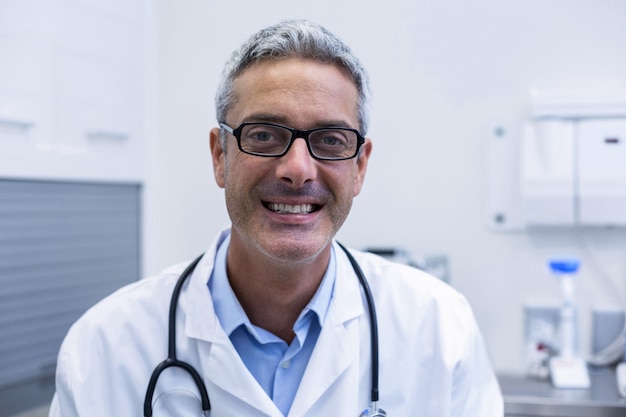 Portrait of dentist in spectacles