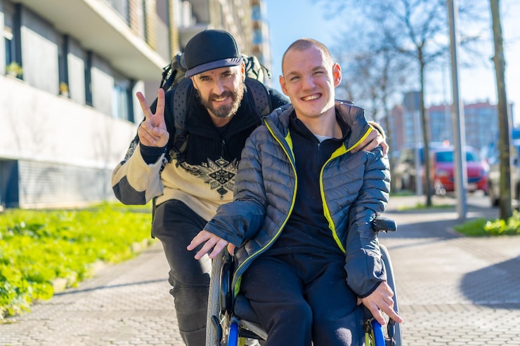 Photo portrait of a disabled person in a wheelchair with a friend normality of disabled people