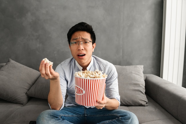 Portrait of a disappointed young asian man