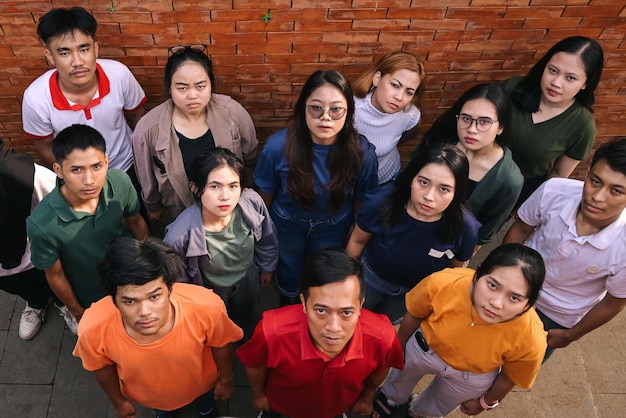 Portrait of Diverse Young People Looking Up High Angle Shot Protest and Demonstration Concept