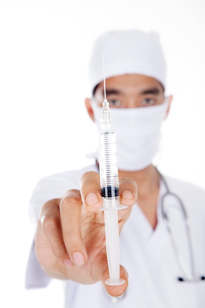 Photo portrait of doctor holding syringe against white background