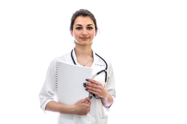 Portrait of a doctor with documents isolated on white