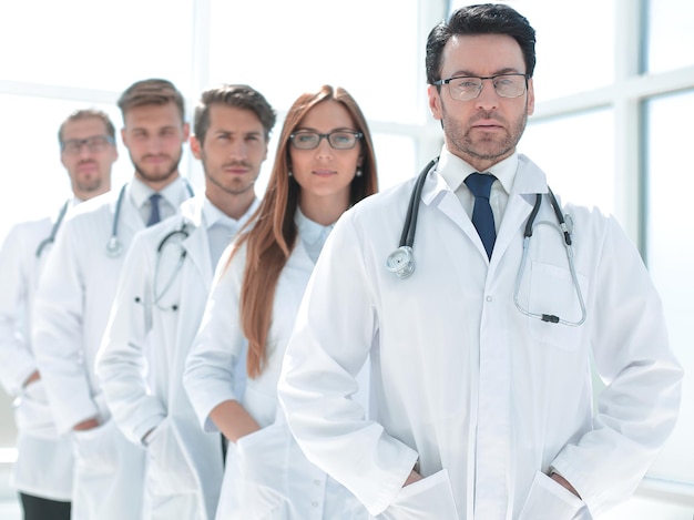 Portrait of doctors standing in a row in the hospital the concept of teamwork