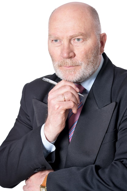 Portrait of elderly businessman on white background