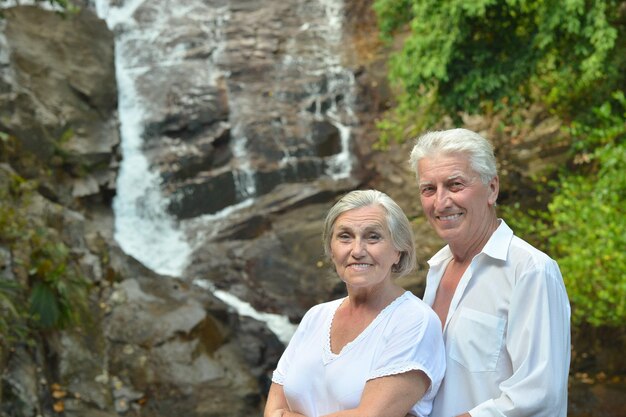 Portrait of elderly couple rest at tropical resort