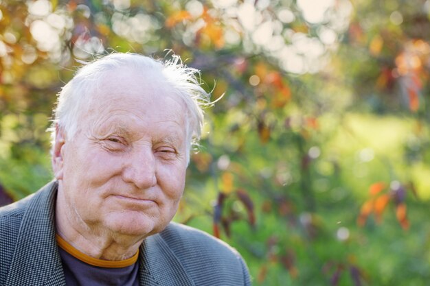 Portrait of  elderly man in  park