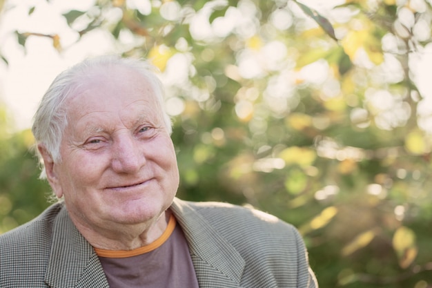 Portrait of  elderly man in  park