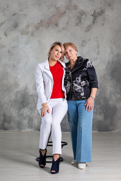 Portrait of elderly woman with her granddaughter