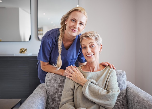 Portrait of elderly woman with a nurse bonding during checkup at assisted living home Smile support and happy mature patient relax and enjoy time with a loving kind healthcare worker on a sofa