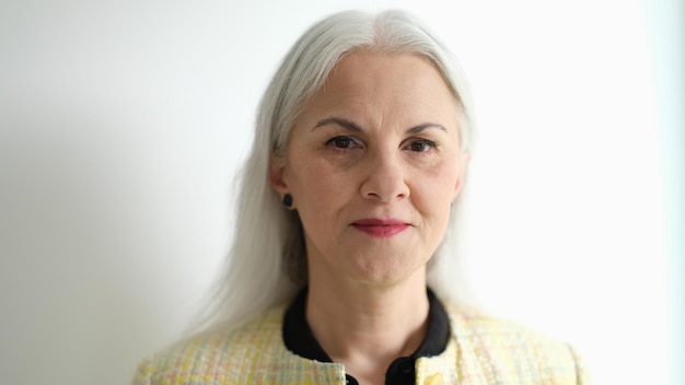 Portrait of elderly woman with perfect skin and natural makeup