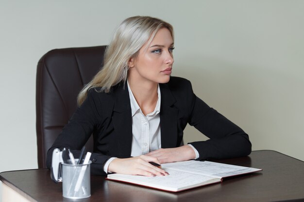 Portrait of elegant businesswoman in suit