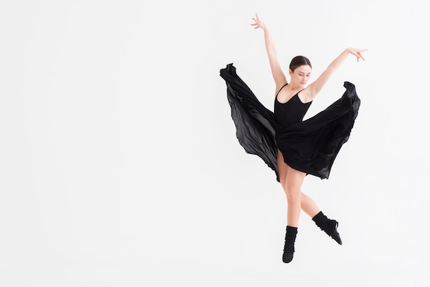 Portrait of elegant woman dancing with grace