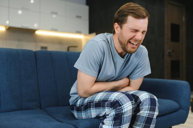 Photo portrait of emotional man crying stressed having mental problems dealing with death in the family loneliness male suffering from depression anxiety or other treatable disorders