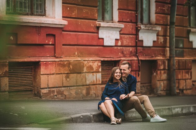 Photo portrait of emotional young couple hugging each other tightly, boyfriend and girlfriend, love you so much, strong affection in relationship