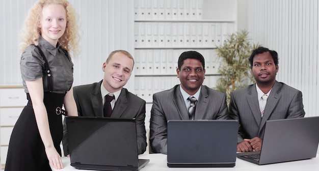 Portrait of employees in the workplace in the office